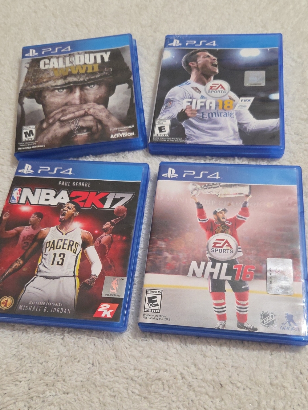 PLAYSTATION 4 SET OF 4 VIDEO GAMES